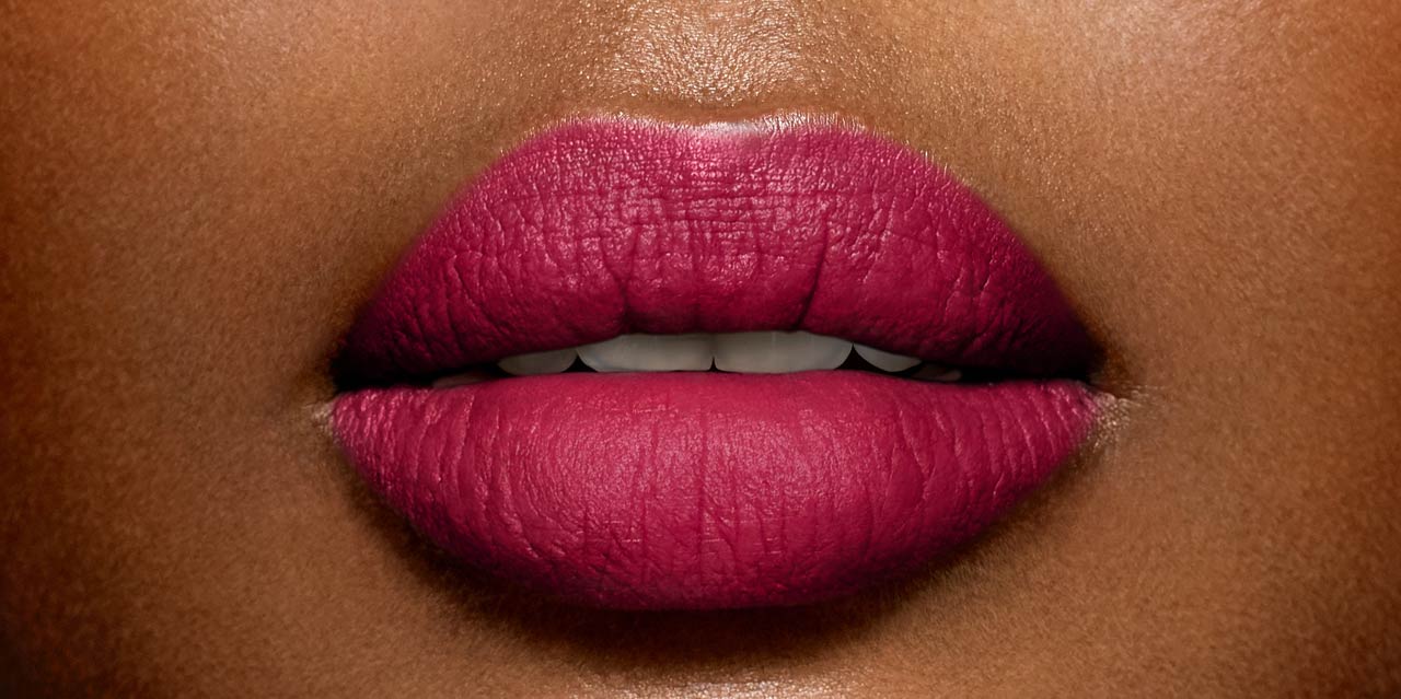Bright Cool Fuchsia Pink lipstick worn on dark skin 